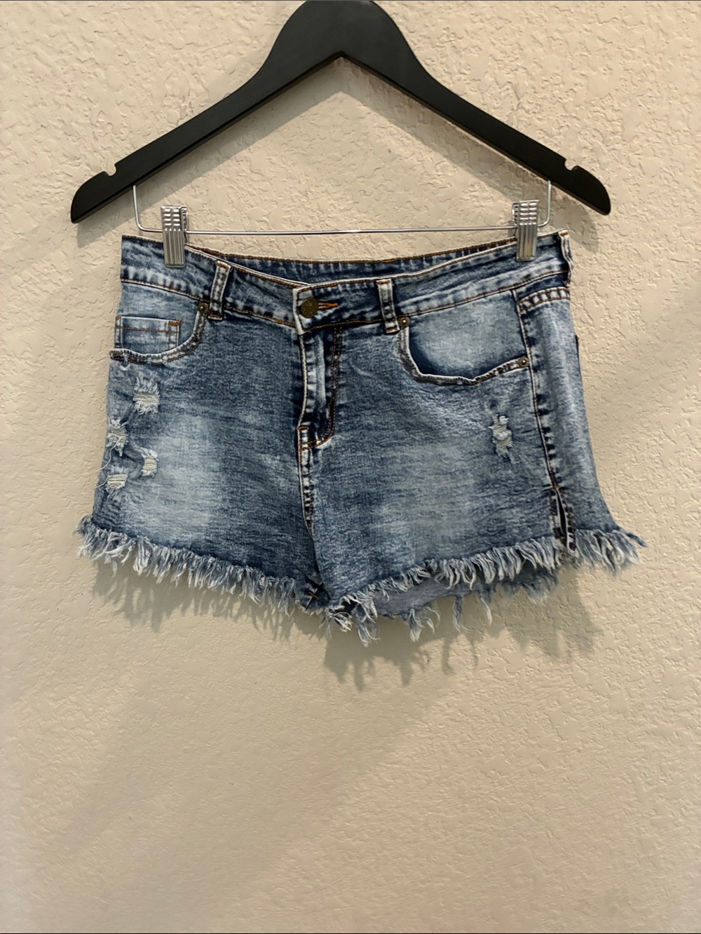Women’s Distressed Light Blue Denim Shorts